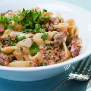 Pasta with crumbled sausage and lemon