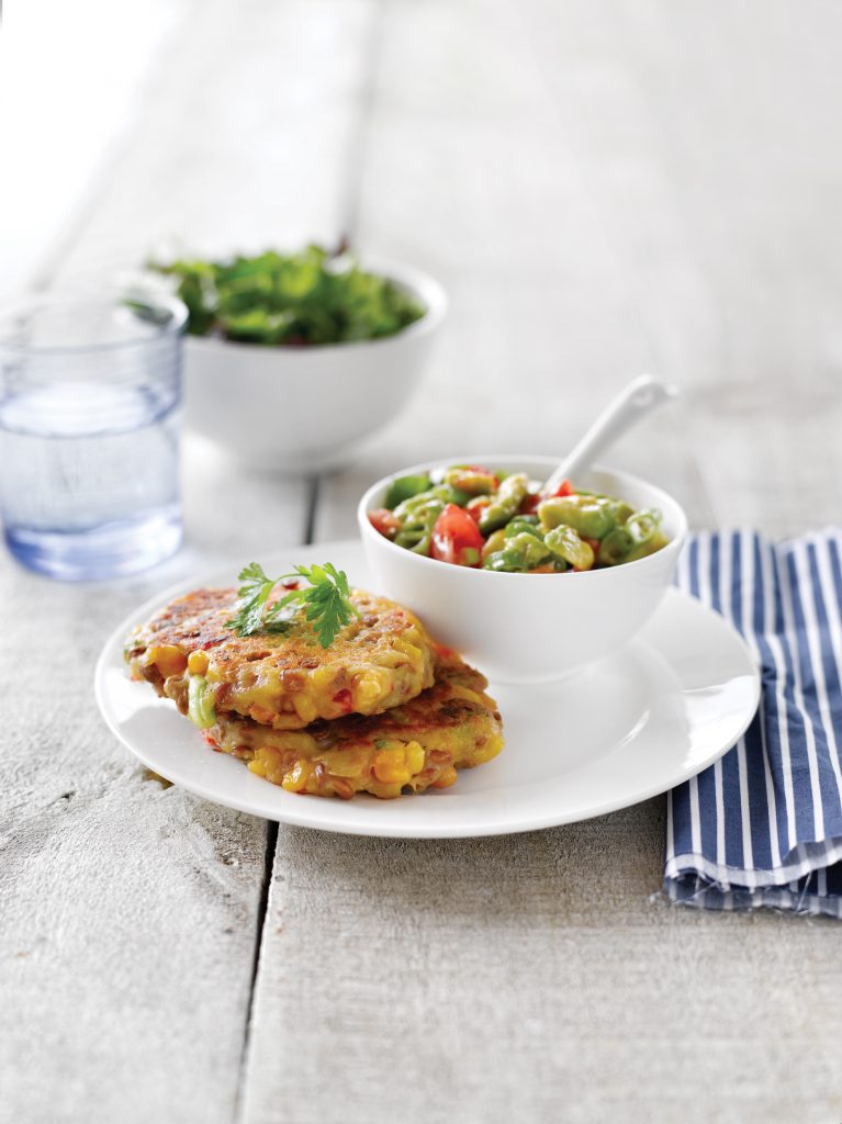 Lentil and corn fritters with tomato and avocado salsa