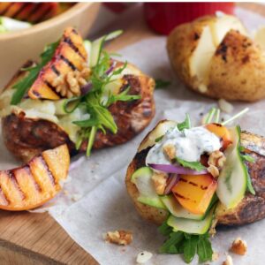 Baked potato with grilled peach salad