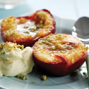 Baked stone fruit with pistachios