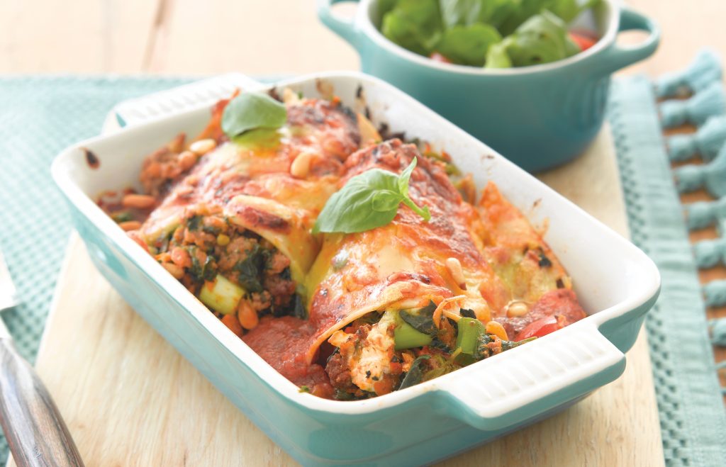 Beef, spinach and feta cannelloni with pine nuts