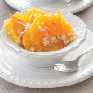 Caramelised oranges with ginger and walnuts