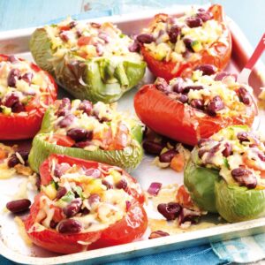 Cheesy rice and bean-stuffed capsicums