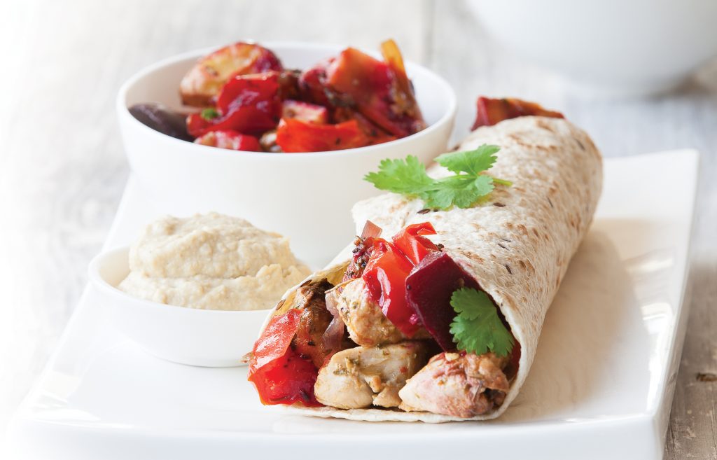 Chicken sizzler with hummus and vege wraps