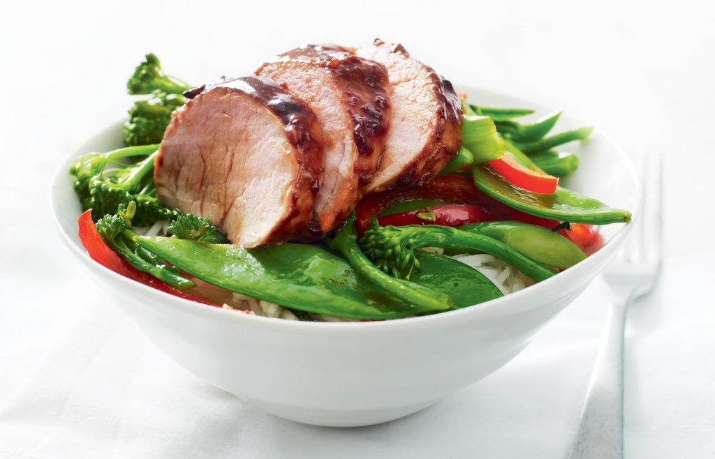 Chinese barbecued pork with stir-fried greens