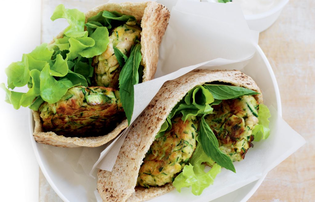 Courgette fritter-filled pitas with tzatziki