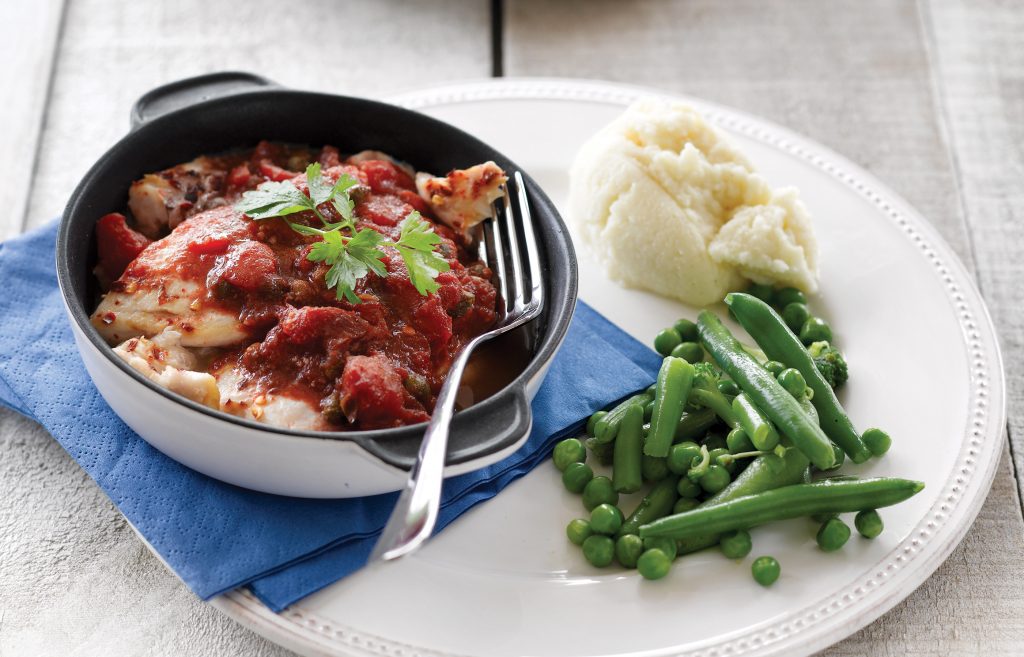 Fish with tomato, capers and mash