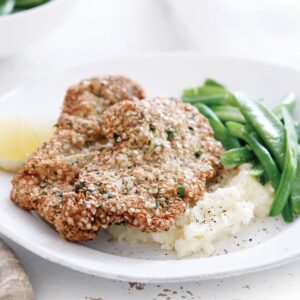 Herb-crumbed beef with creamy mash
