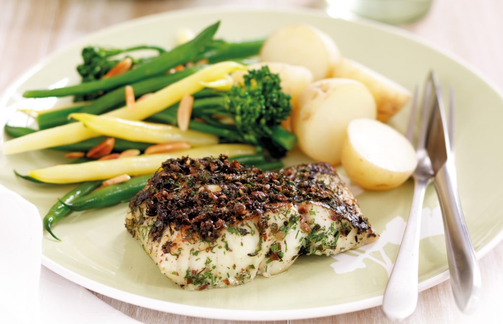 Herb-crusted fish with broccolini and beans