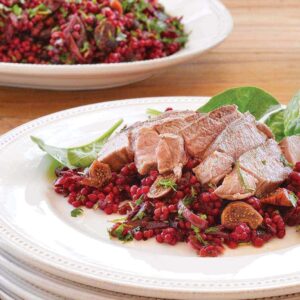 Lamb steaks with beetroot and fig Israeli couscous