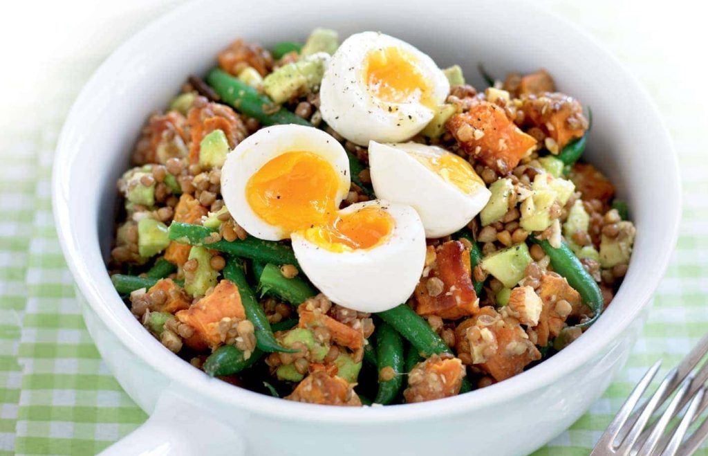 Lentil and avocado salad with soft-boiled eggs