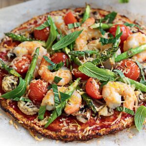 Prawn, asparagus and cherry tomato pizza with cauliflower crust