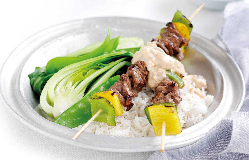 Satay beef skewers with Asian greens