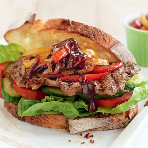 Steak sandwich with caramelised onion and capsicum