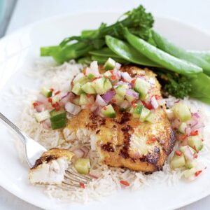 Tandoori fish with cucumber salsa and steamed greens