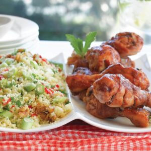 Marinated chicken drumsticks with couscous salad