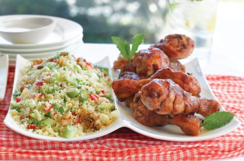 Marinated chicken drumsticks with couscous salad