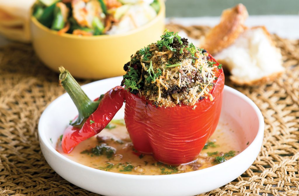 Tasty stuffed capsicums with spring salad