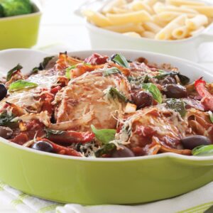 Tuscan-style chicken baked with tomatoes and olives