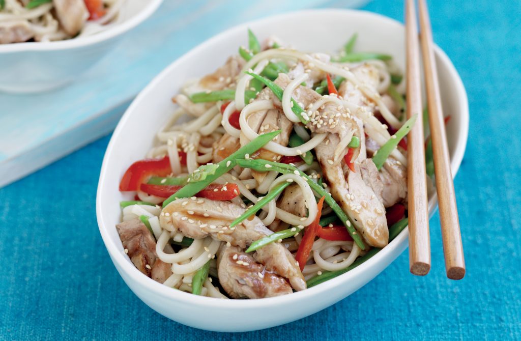 Udon noodles with grilled Asian chicken and snow peas