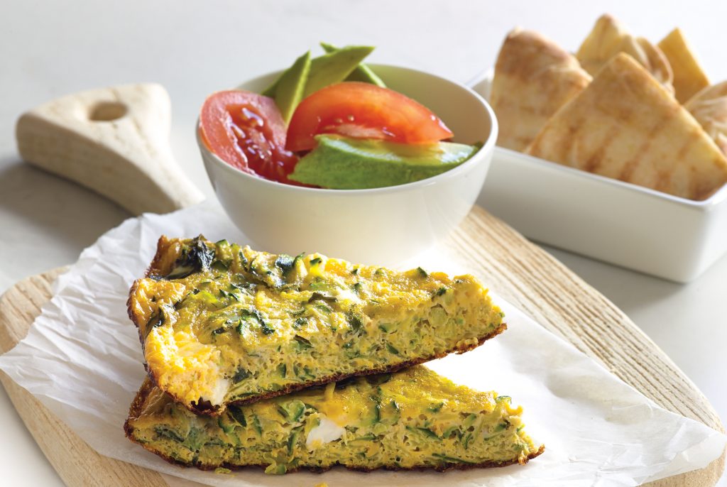 Courgette, mint and feta omelette with pita wedges