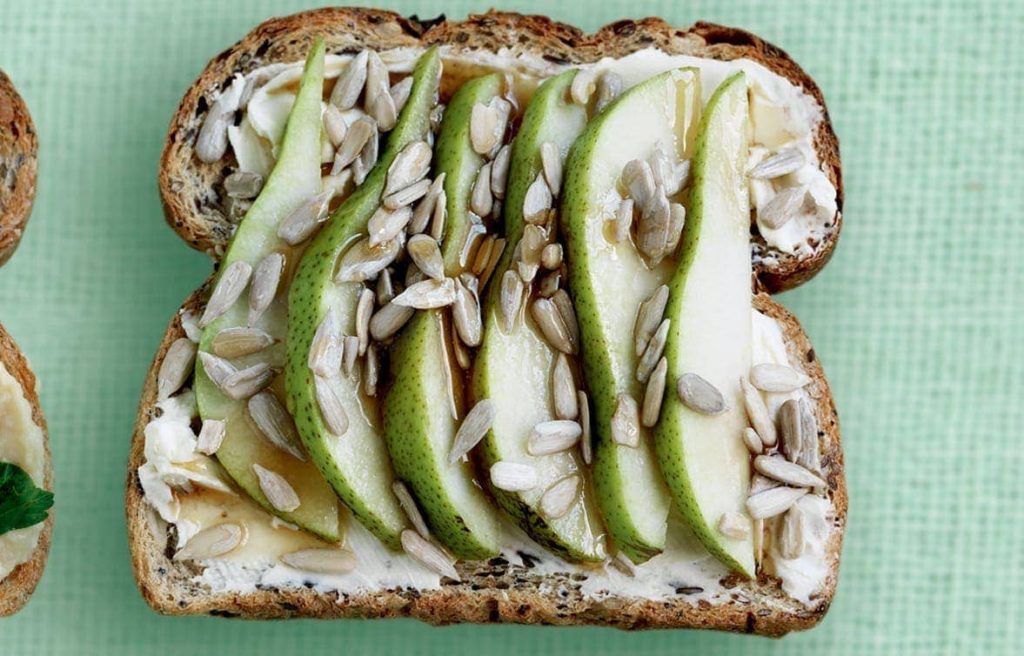 Cream cheese, pear, seeds and maple syrup toast topper