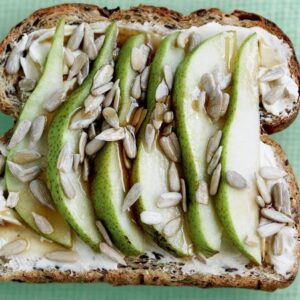Cream cheese, pear, seeds and maple syrup toast topper