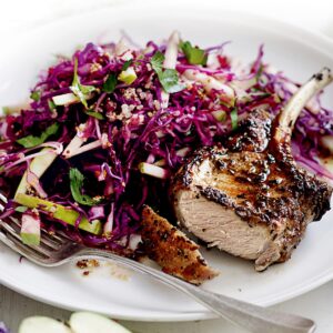 Grilled pork with beetroot, apple and quinoa coleslaw