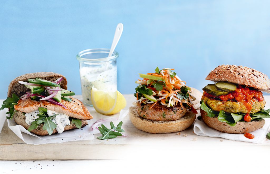 Grilled salmon burgers with dill-caper sauce