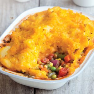 Lentil and tomato pie with golden mash