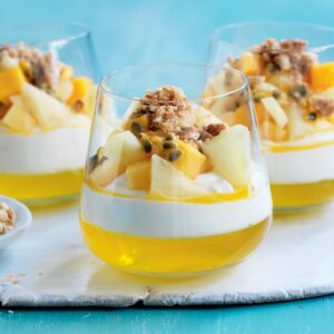 Passionfruit, pineapple and mango cheesecake pots