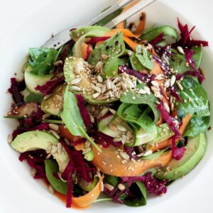 Raw vege side salad with avocado and seeds