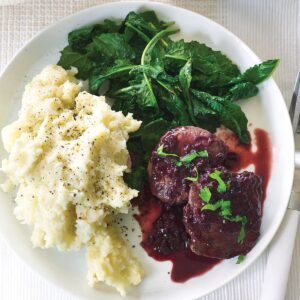 Seared venison with creamy mash and boysenberry sauce