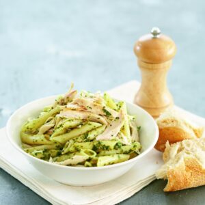 Chicken pasta with basil, parsley and caper sauce