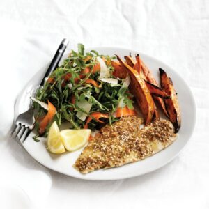 Dukkah-crumbed fish with rocket and parmesan salad and oven-baked chips