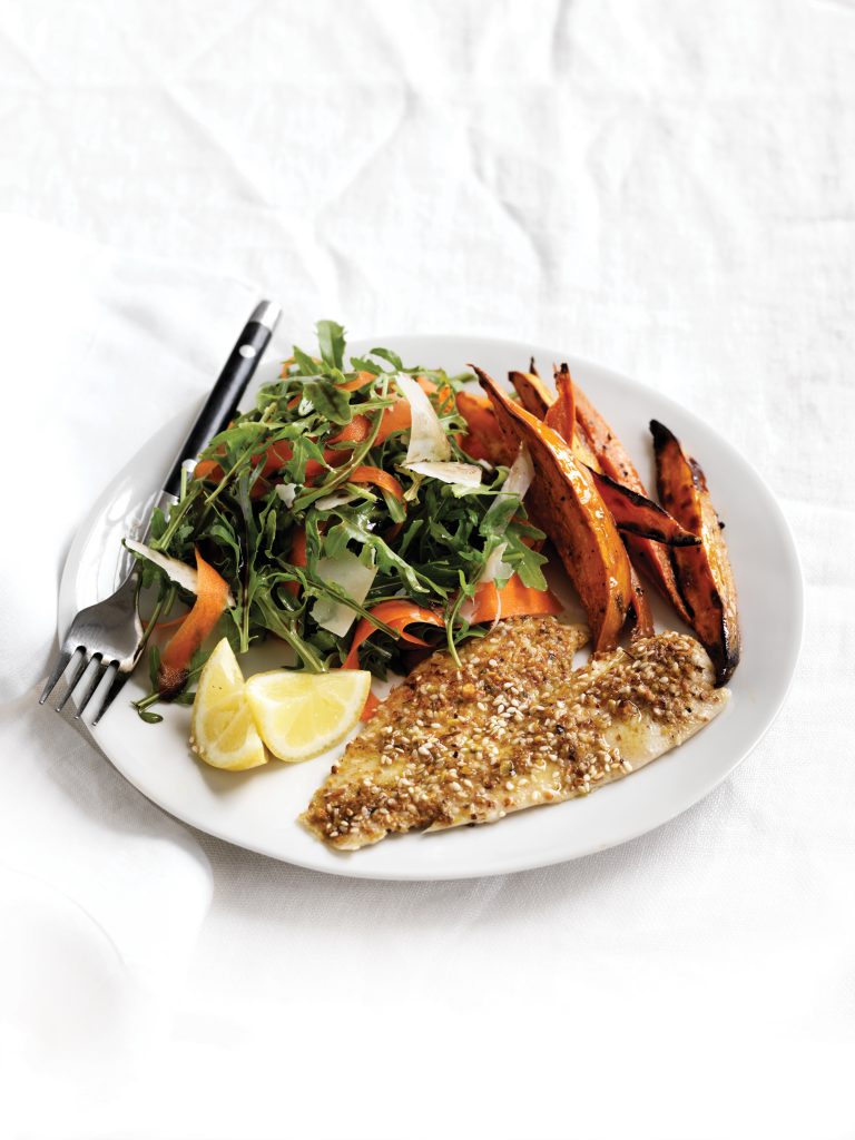 Dukkah-crumbed fish with rocket and parmesan salad and oven-baked chips ...