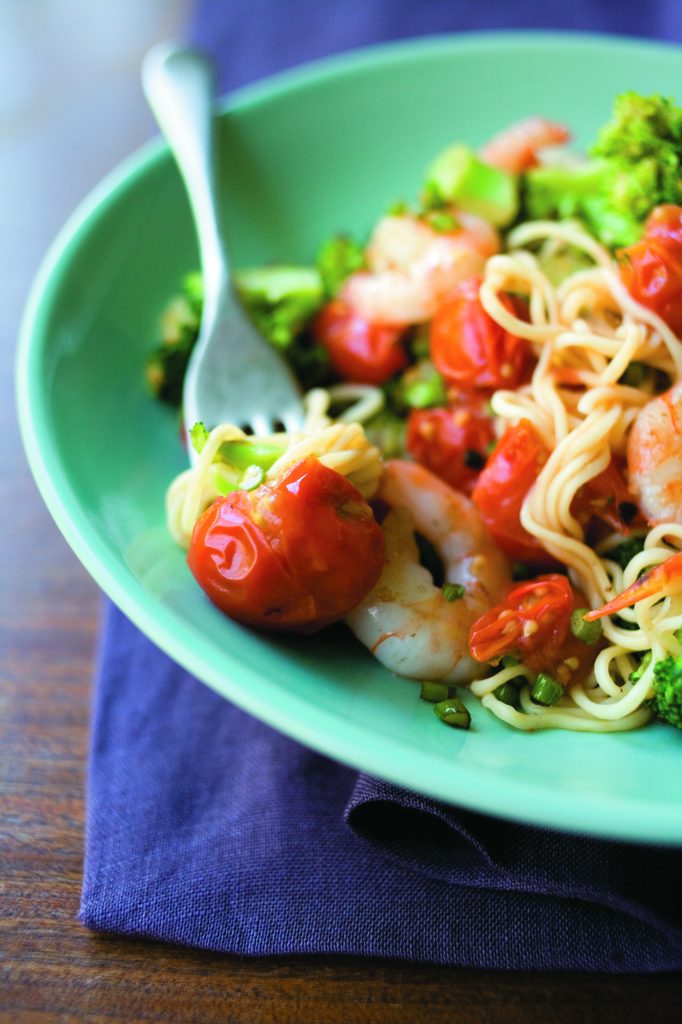 Garlic prawns with broccoli and squashed tomatoes