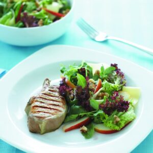 Grilled pork with pear and cheddar salad