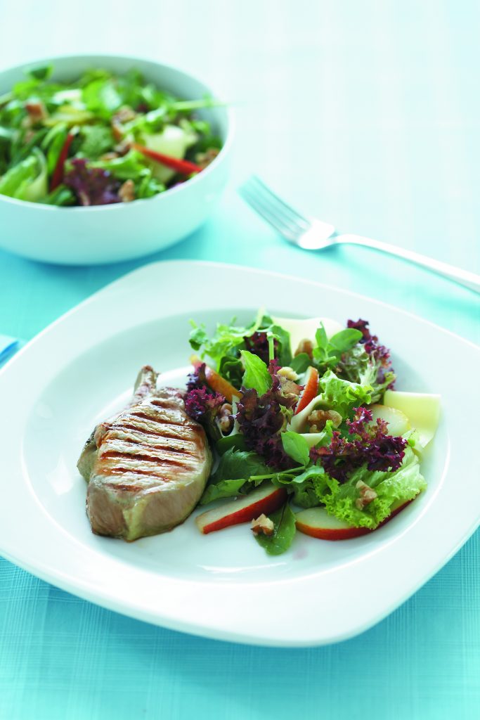 Grilled pork with pear and cheddar salad