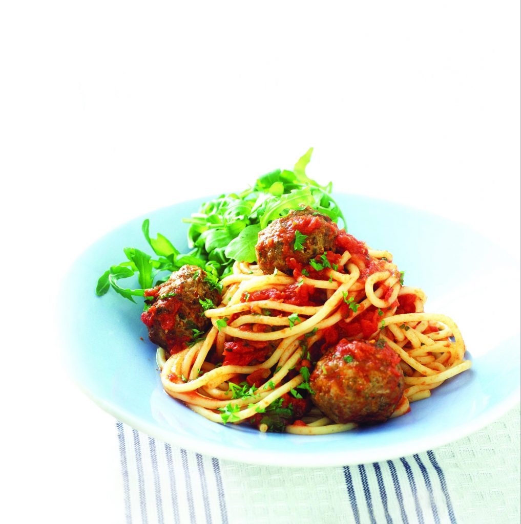 Herby meatballs with spaghetti and tomato sauce