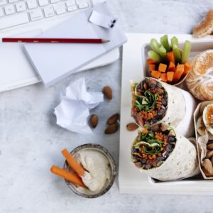 Lunchbox: Smashed black bean, avocado and rocket wrap + snacks