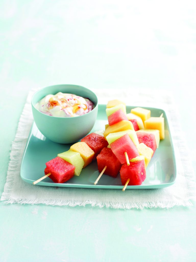 Melon skewers with berry swirl yoghurt