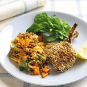 Oat-crusted lamb cutlets with spiced lentils