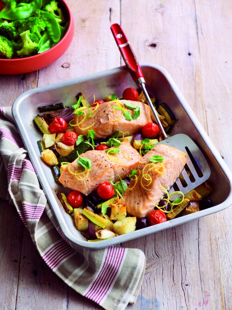 Oven-roasted salmon with oregano, lemon and tender veges