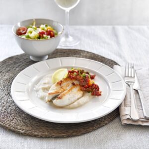 Pan-fried fish with cauliflower puree and citrus caper salsa