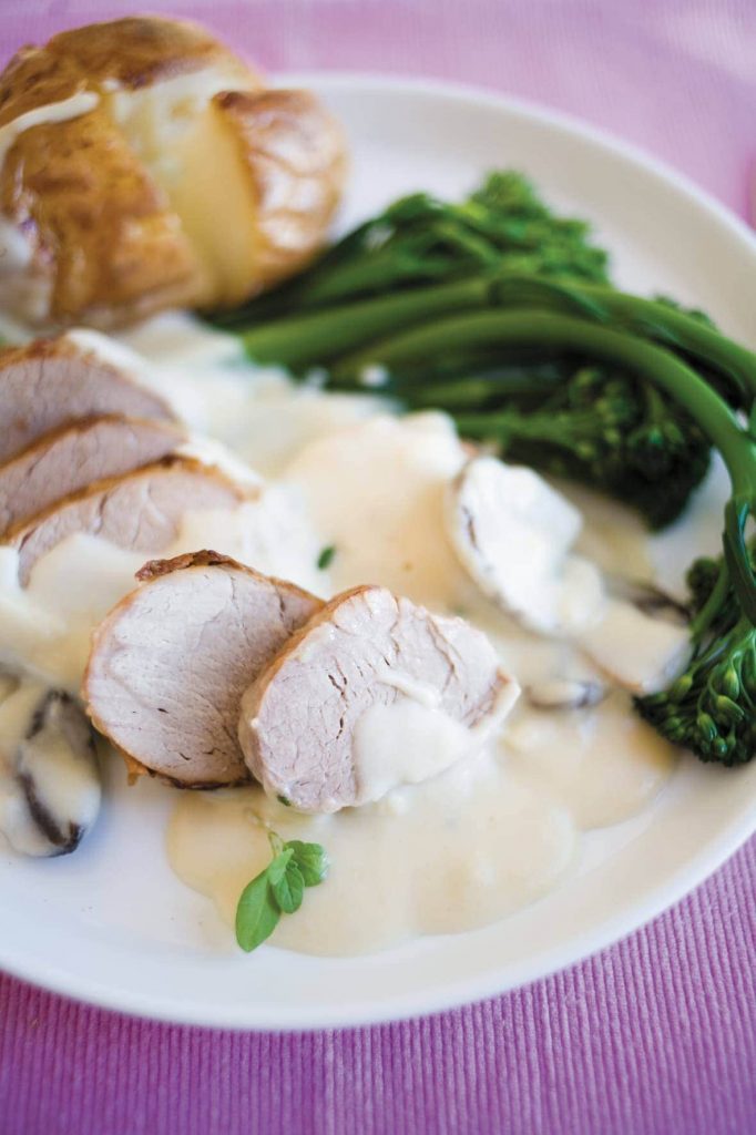 Pork with herby white wine sauce