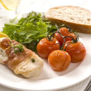 Prosciutto-wrapped fish with roasted vine tomatoes
