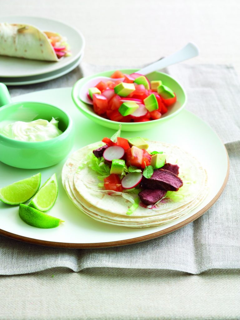 Soft beef tacos with radish and tomato salsa