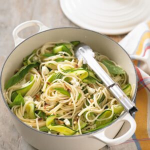 Spaghetti with courgettes, feta, mint and pine nuts