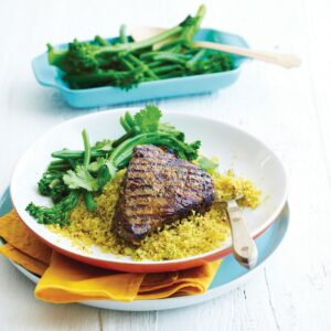 Steak with spiced couscous and broccolini